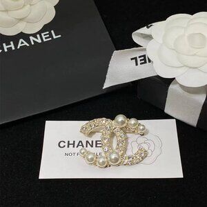 Chanel gold brooch